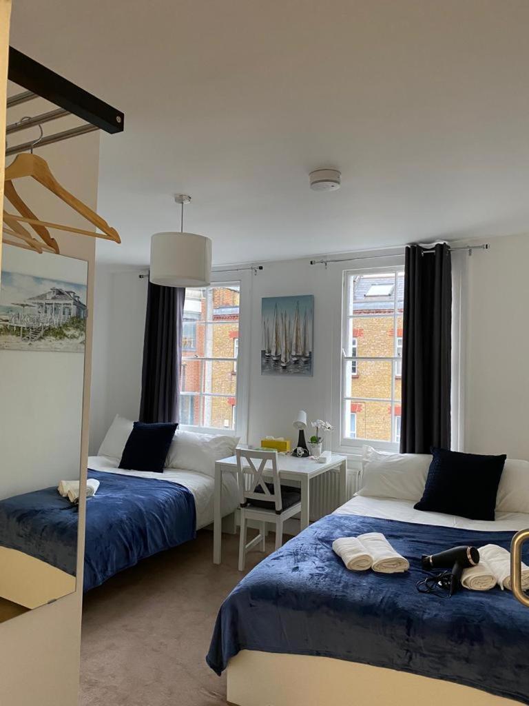 Gazde/Camere de închiriat Comfy Private In Camden Town, *